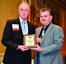 Bill Bradshaw receives award for Outstanding SRVP of the Year with ASIS International